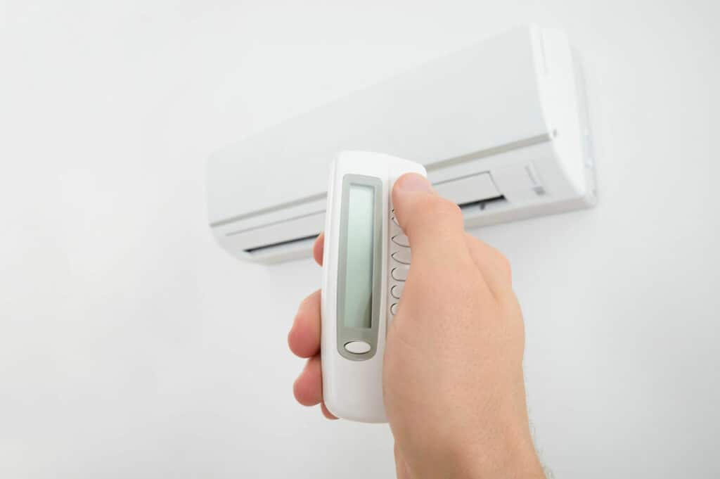 Adjustment of a wall mounted air conditioner